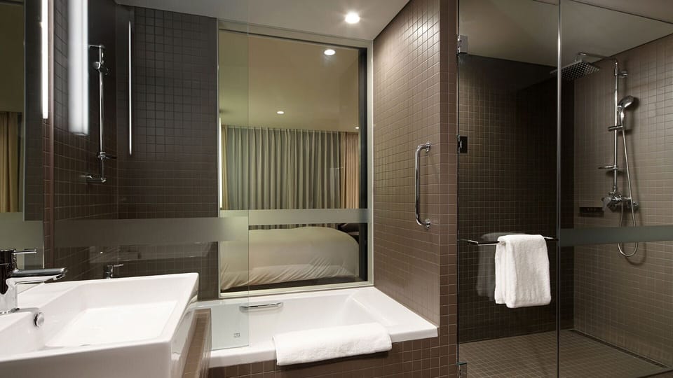 Premium bedding, down comforters, in-room safe, desk