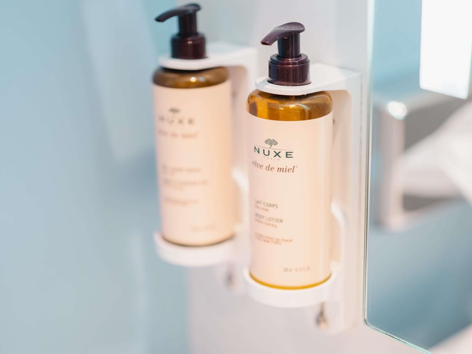 Premium bedding, Select Comfort beds, desk, blackout drapes