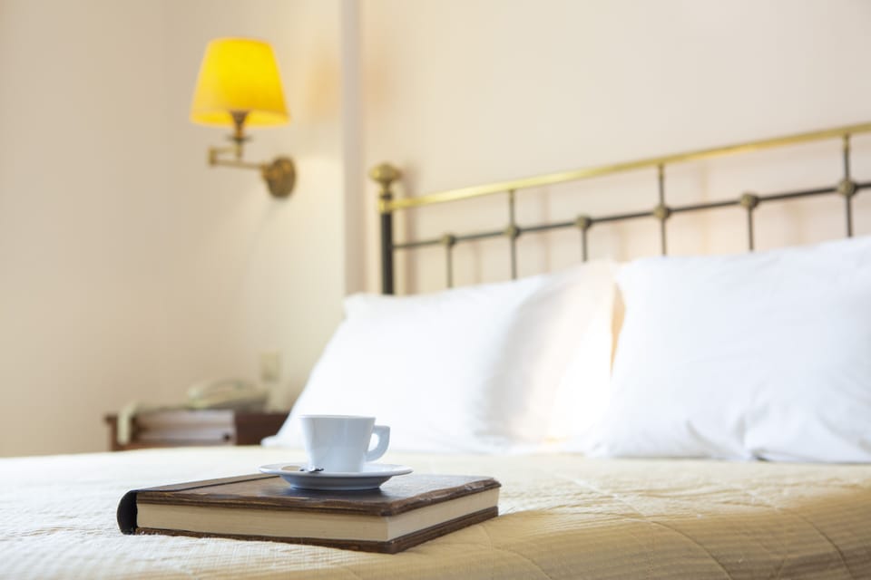 Double Room, Sea View | Minibar, individually decorated, desk, blackout drapes
