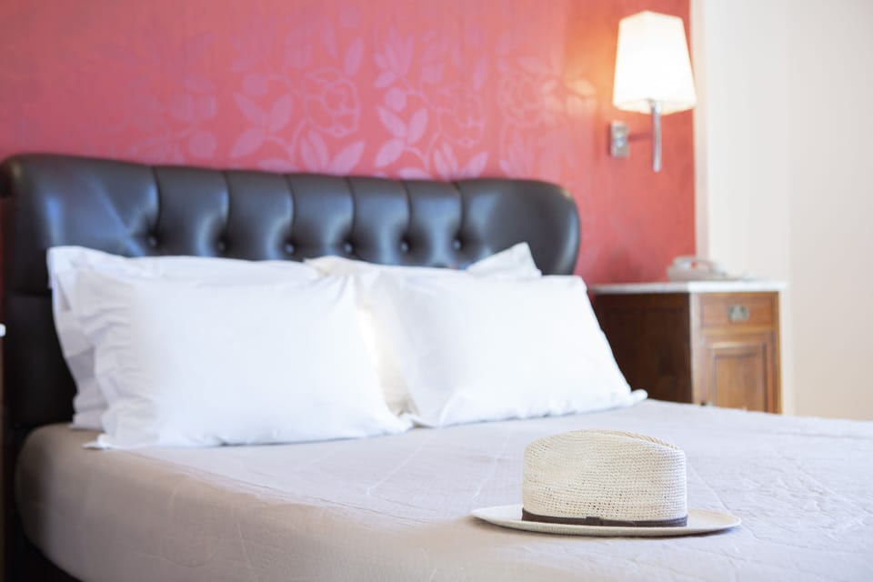 Double Room, Sea View | Minibar, individually decorated, desk, blackout drapes