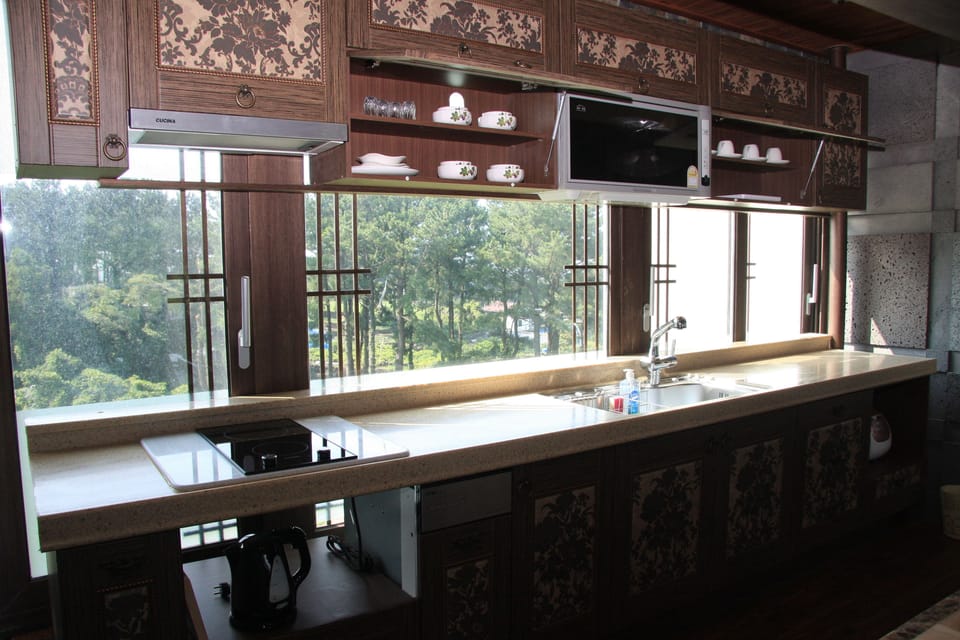 Family Room | Private kitchen | Fridge, electric kettle