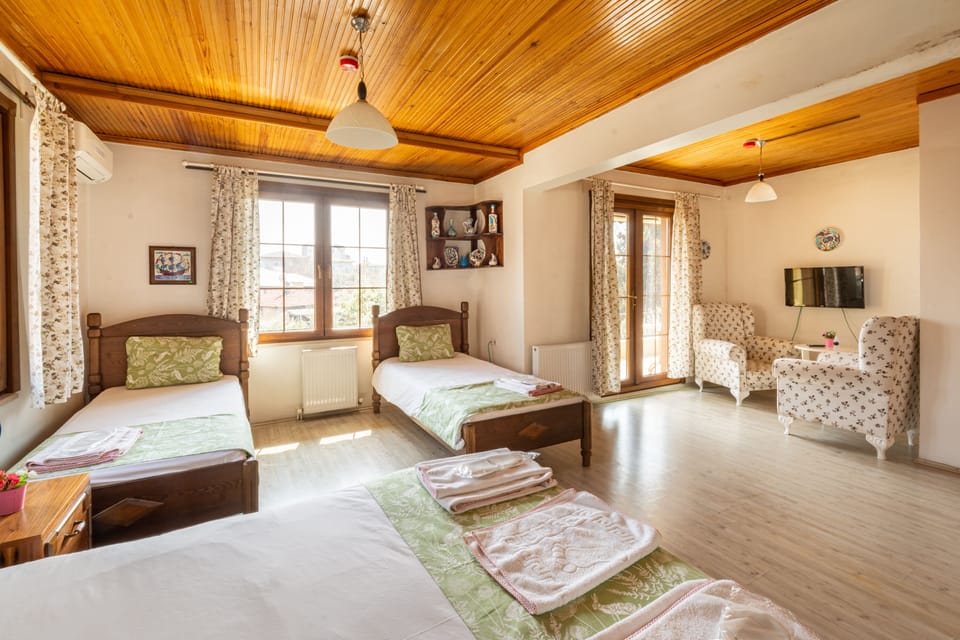 Family Quadruple Room, Garden View | Premium bedding, individually furnished, desk, blackout drapes