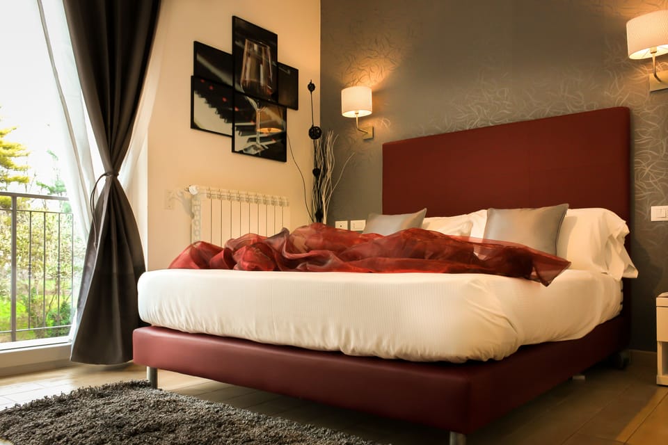 Premium bedding, down comforters, minibar, in-room safe