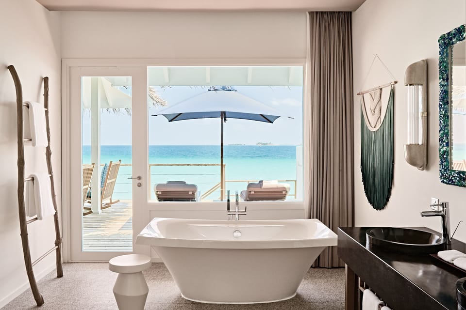 Separate tub and shower, rainfall showerhead, free toiletries