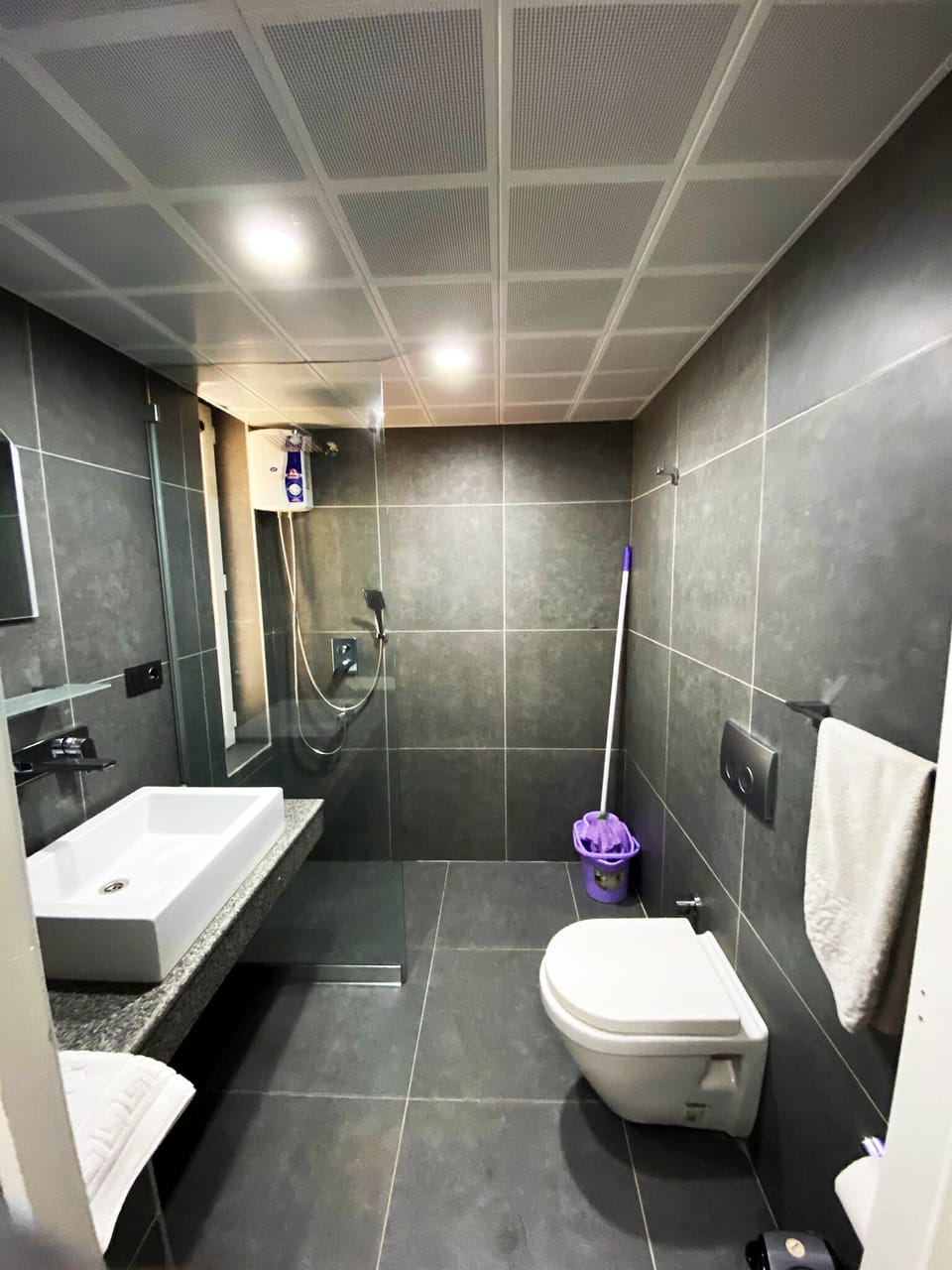 Shower, rainfall showerhead, free toiletries, hair dryer