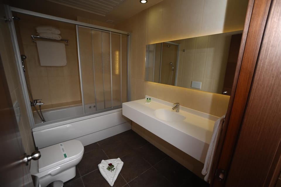 Shower, free toiletries, hair dryer, bathrobes