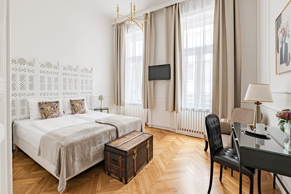 Superior Double or Twin Room | In-room safe, desk, blackout drapes, iron/ironing board
