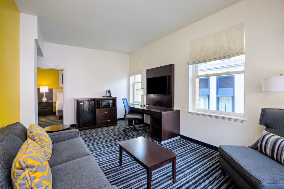 Suite, 1 King Bed with Sofa bed | Premium bedding, desk, iron/ironing board, free cribs/infant beds