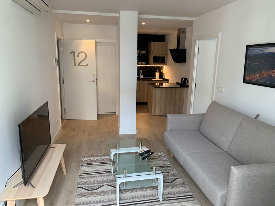 Superior Double Room | Living room | Flat-screen TV