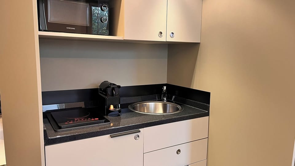 Mini-fridge, microwave, coffee/tea maker, electric kettle