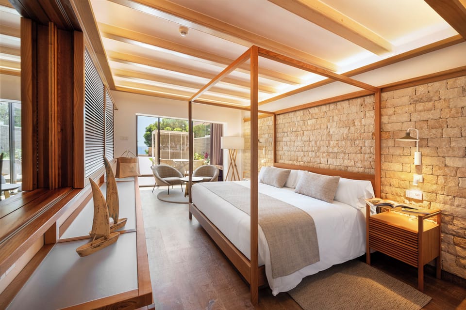 Deluxe Sea View and Chill Out Terrace | Minibar, in-room safe, desk, laptop workspace
