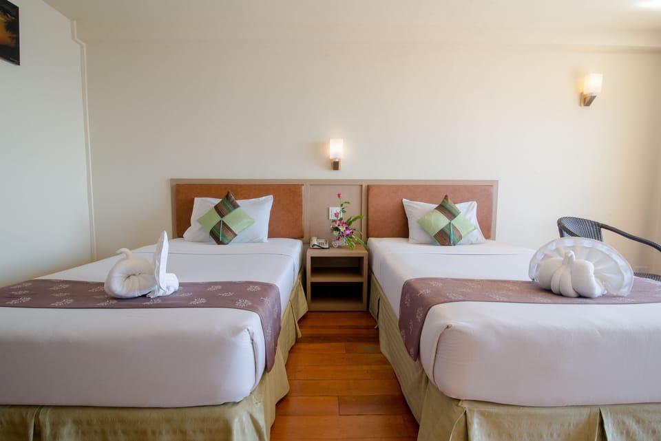 Deluxe Room Sea View | In-room safe, cribs (free), rollaway beds (surcharge), WiFi (free)