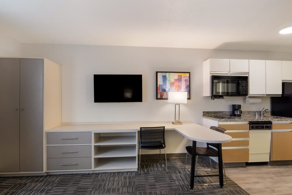 Suite, 2 Double Beds, Non Smoking | Living area | 32-inch flat-screen TV with cable channels, TV