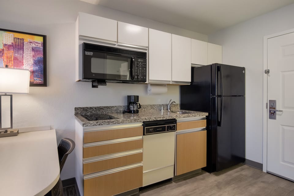 Suite, 2 Double Beds, Non Smoking | Private kitchen | Full-size fridge, microwave, stovetop, dishwasher