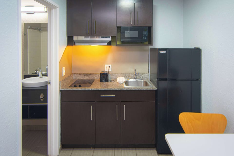 Fridge, microwave, stovetop, coffee/tea maker