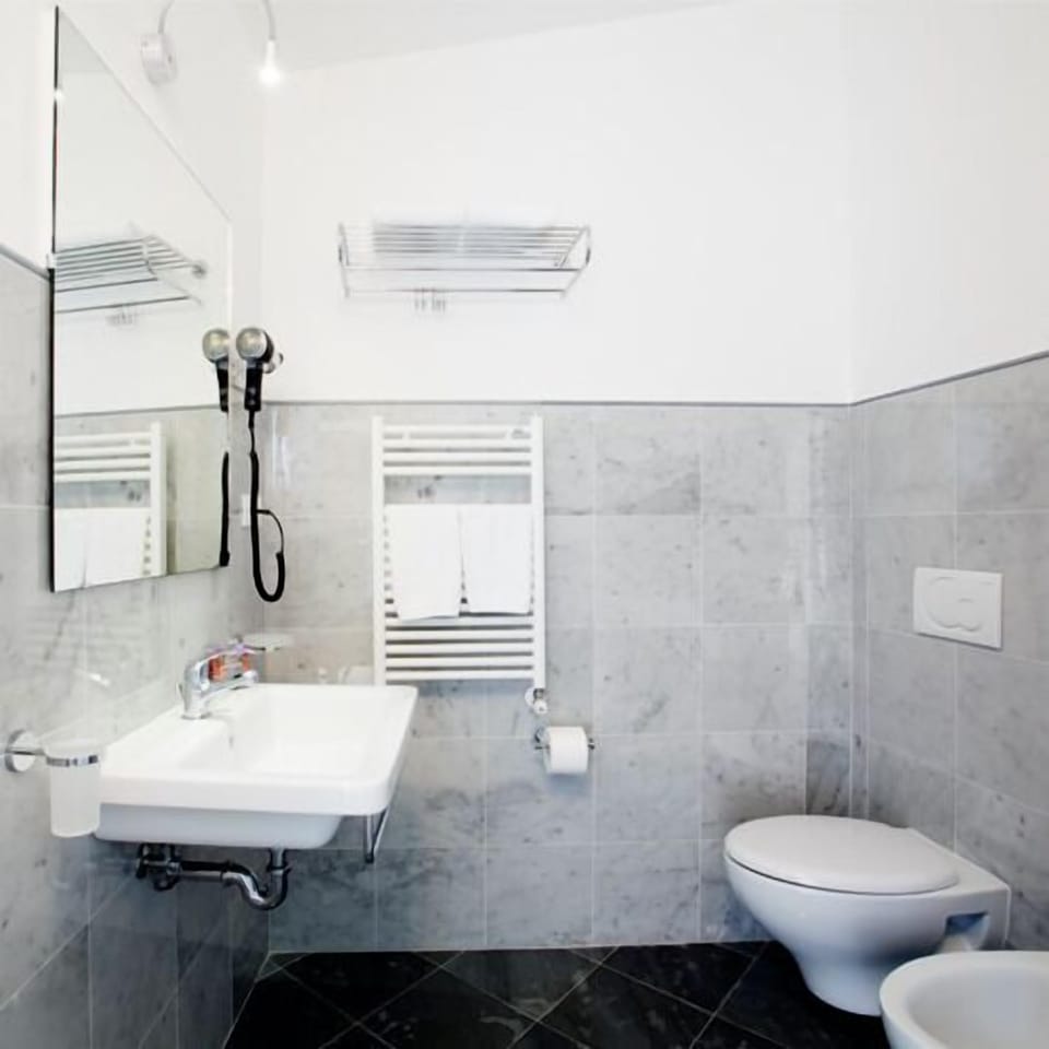 Shower, free toiletries, hair dryer, slippers