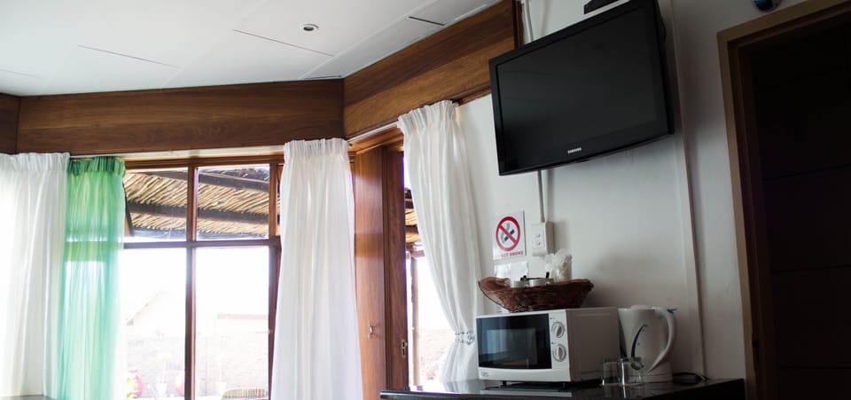 Comfort Double Room, Pool View, Garden Area | Room amenity