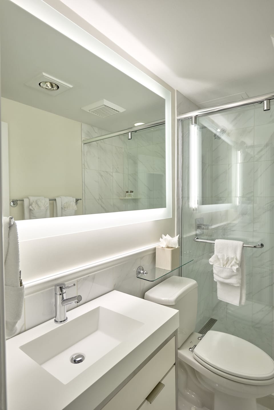 Shower, designer toiletries, hair dryer, bathrobes