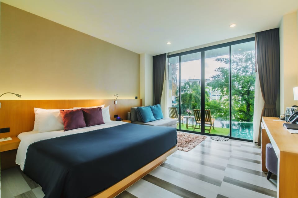 Classic Pool Access King Room | In-room safe, individually decorated, individually furnished, desk