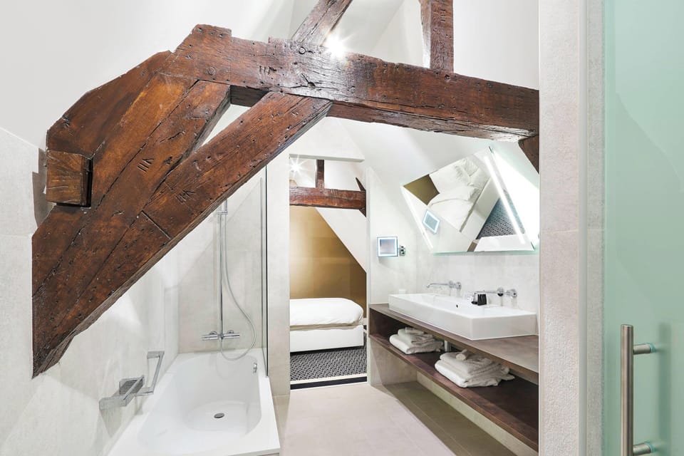 Junior Suite, 1 King Bed with Sofa bed | Bathroom | Rainfall showerhead, designer toiletries, hair dryer, towels