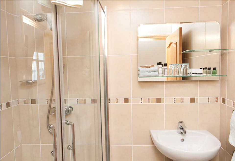 Shower, hair dryer, bathrobes, towels