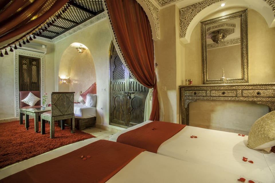 Suite (Bougainvillier) | Egyptian cotton sheets, premium bedding, down comforters, in-room safe