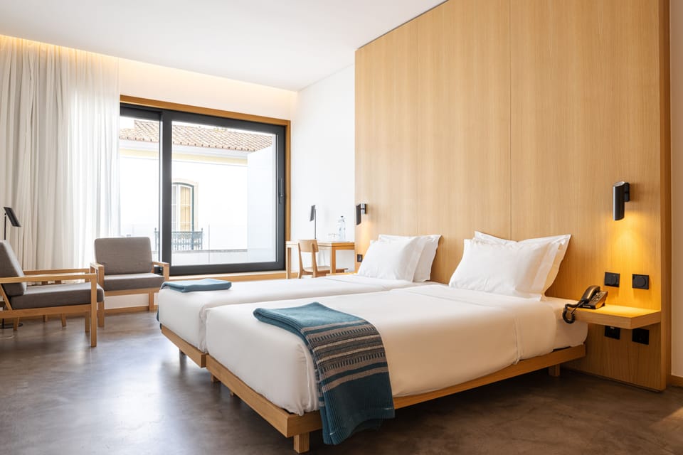 Standard Double or Twin Room | Minibar, in-room safe, individually decorated, individually furnished