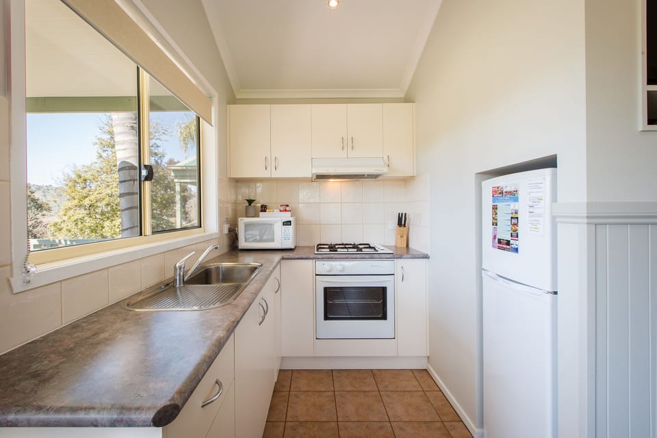 Superior 2 Bedroom Cabin | Private kitchen | Microwave, stovetop, electric kettle, cookware/dishes/utensils