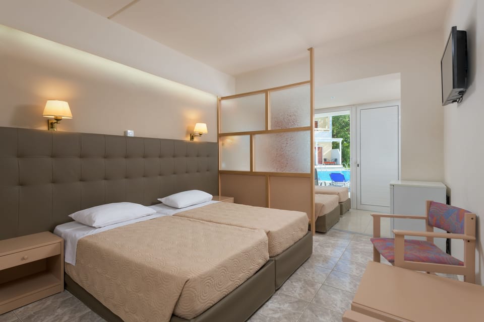 Family Room, Balcony | In-room safe, soundproofing, free cribs/infant beds, WiFi