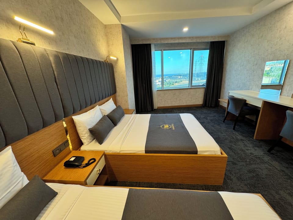 Standard Family Room with Sea View | Premium bedding, minibar, in-room safe, soundproofing