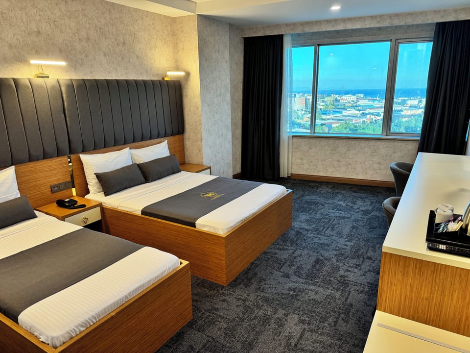 Standard Family Room with Sea View | Premium bedding, minibar, in-room safe, soundproofing