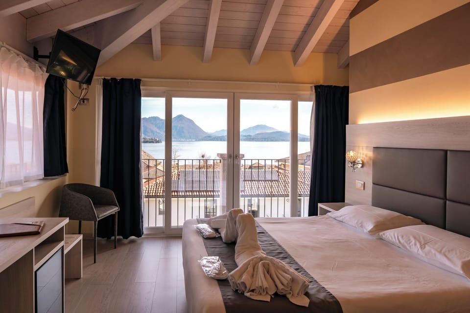 Premium Double Room, Lake View | Hypo-allergenic bedding, down comforters, minibar, in-room safe