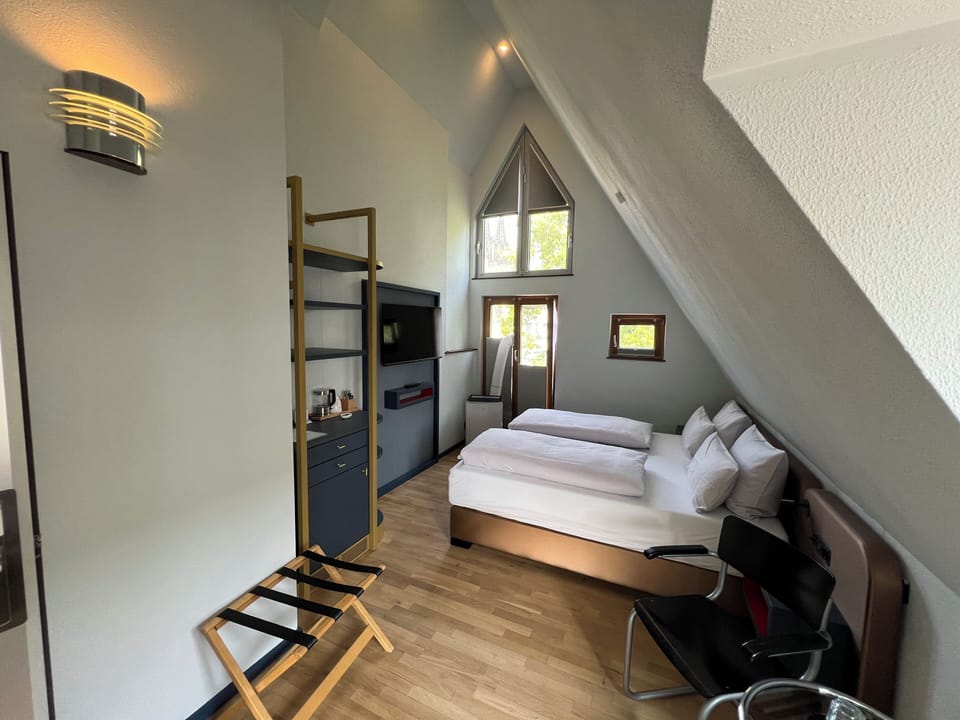 Deluxe Double Room | Minibar, in-room safe, individually decorated, individually furnished