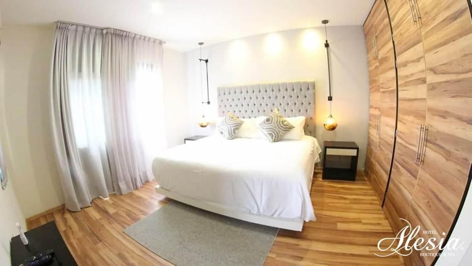 Premium bedding, down comforters, pillowtop beds, in-room safe