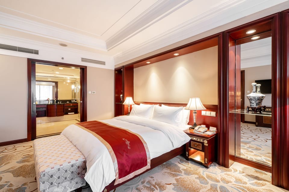 Executive Suite 2 Rooms | Minibar, in-room safe, iron/ironing board, free WiFi
