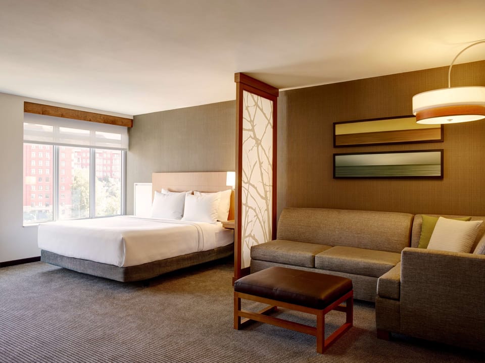 Hypo-allergenic bedding, down comforters, in-room safe, desk