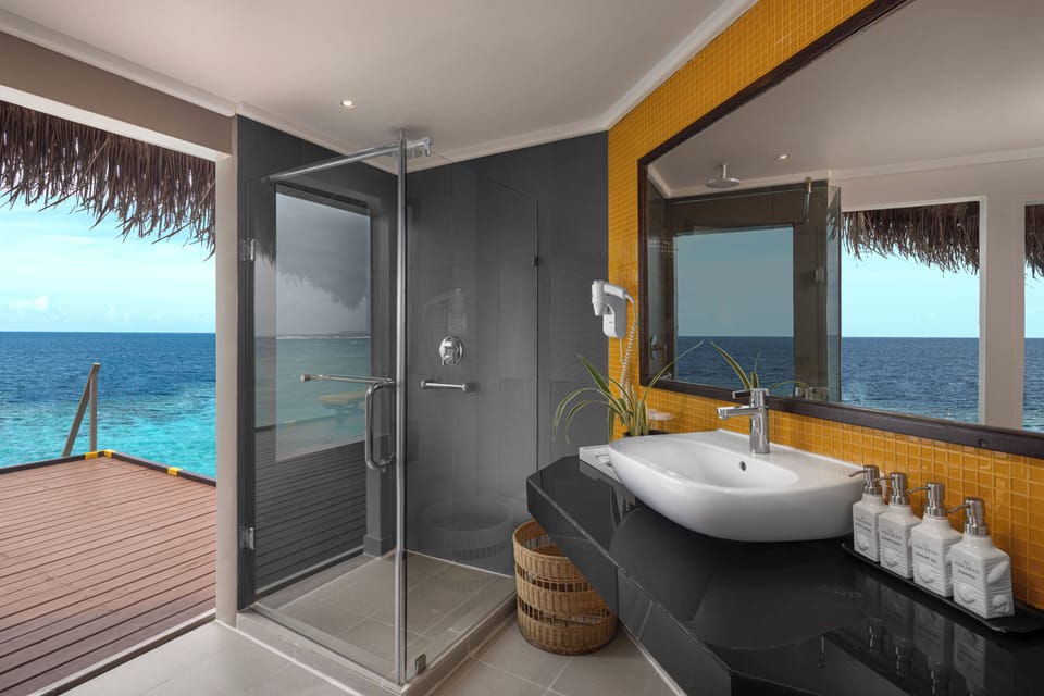 Villa (Water) | Bathroom | Shower, rainfall showerhead, free toiletries, hair dryer
