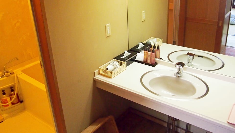 Japanese Western Room (15Tatami-mats & Twin Bed) | Bathroom amenities | Shower, deep soaking tub, free toiletries, hair dryer