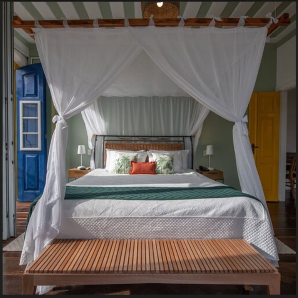 Suíte Master | Egyptian cotton sheets, premium bedding, minibar, in-room safe