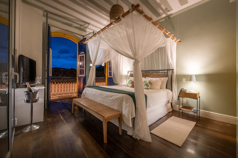 Suíte Master | Egyptian cotton sheets, premium bedding, minibar, in-room safe