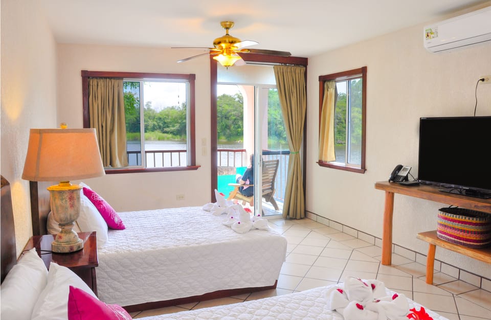 Premium Room, 2 Queen Beds, River View | Desk, blackout drapes, soundproofing, bed sheets