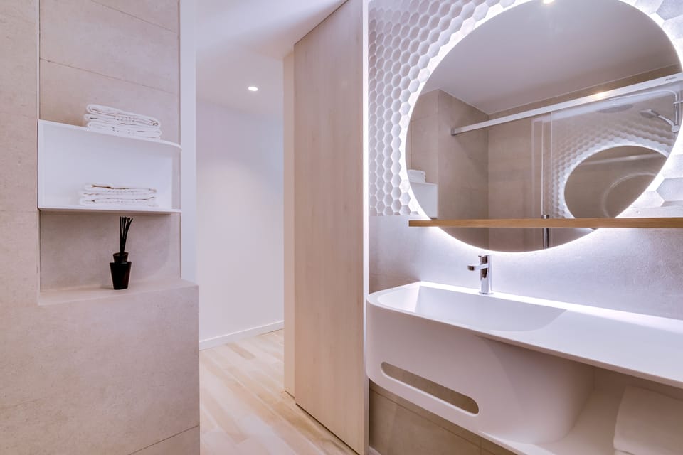 Shower, free toiletries, hair dryer, slippers