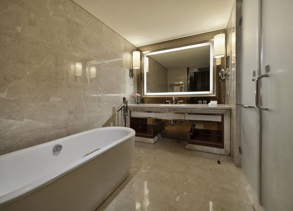 Combined shower/tub, hair dryer, bathrobes, slippers
