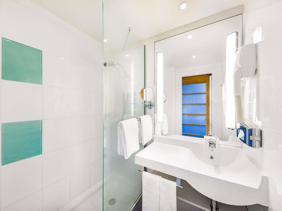 Eco-friendly toiletries, hair dryer, towels