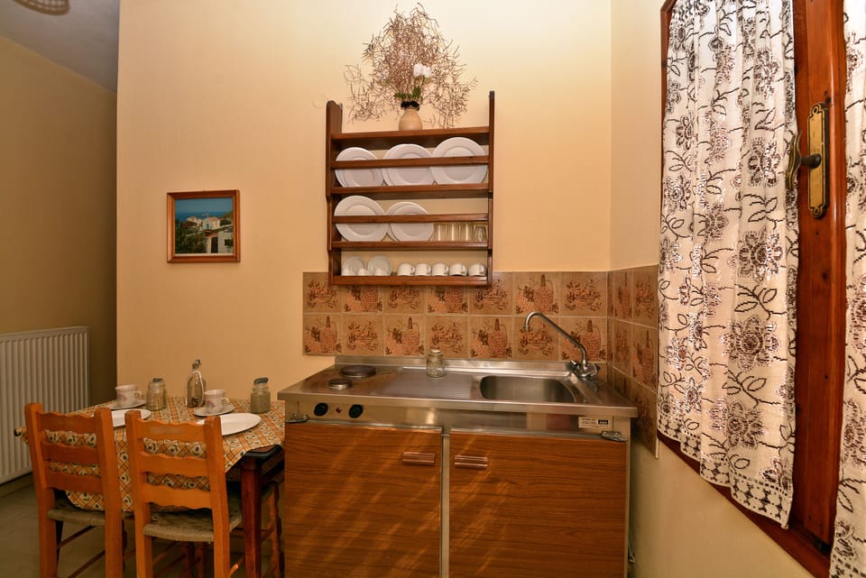 Family Apartment, 2 Bedrooms, Partial Sea View | Private kitchenette | Fridge, stovetop, coffee/tea maker, electric kettle