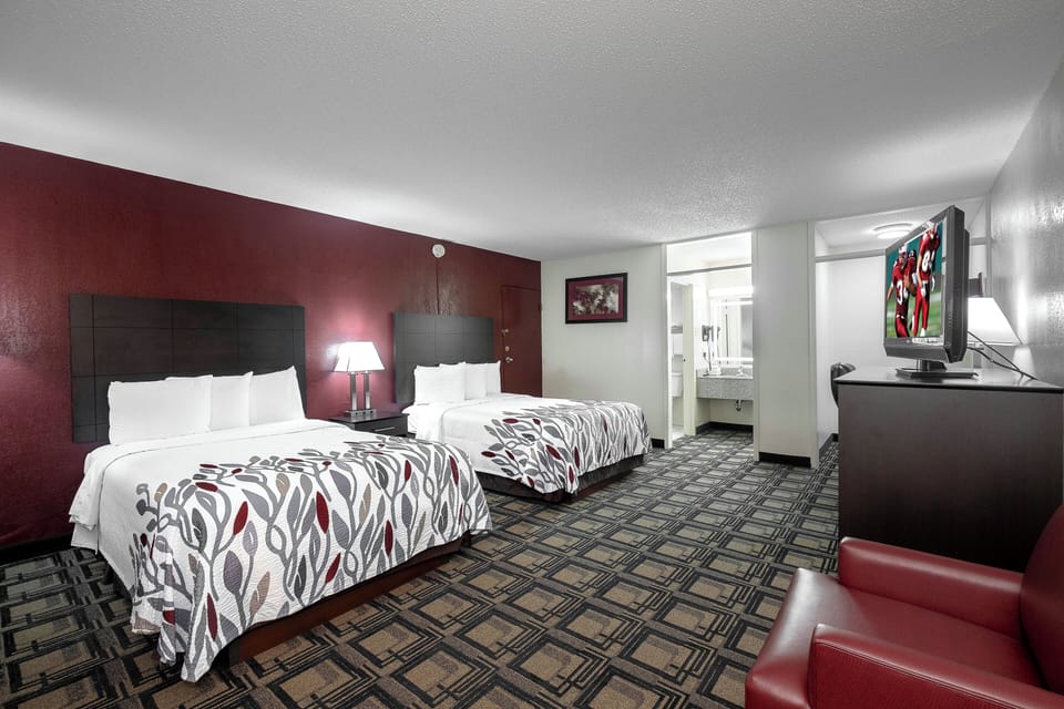 Desk, laptop workspace, cribs (free), WiFi (free)