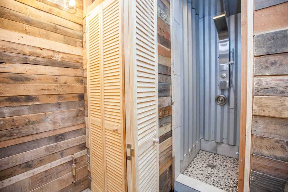 Shower, free toiletries, slippers, towels