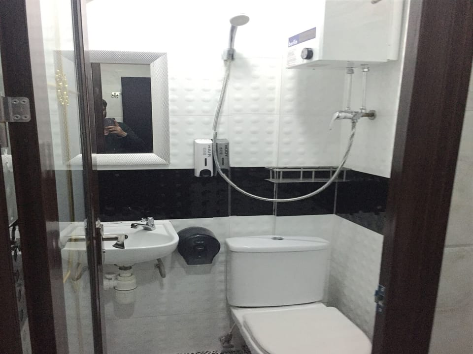 Shower, free toiletries, hair dryer, slippers