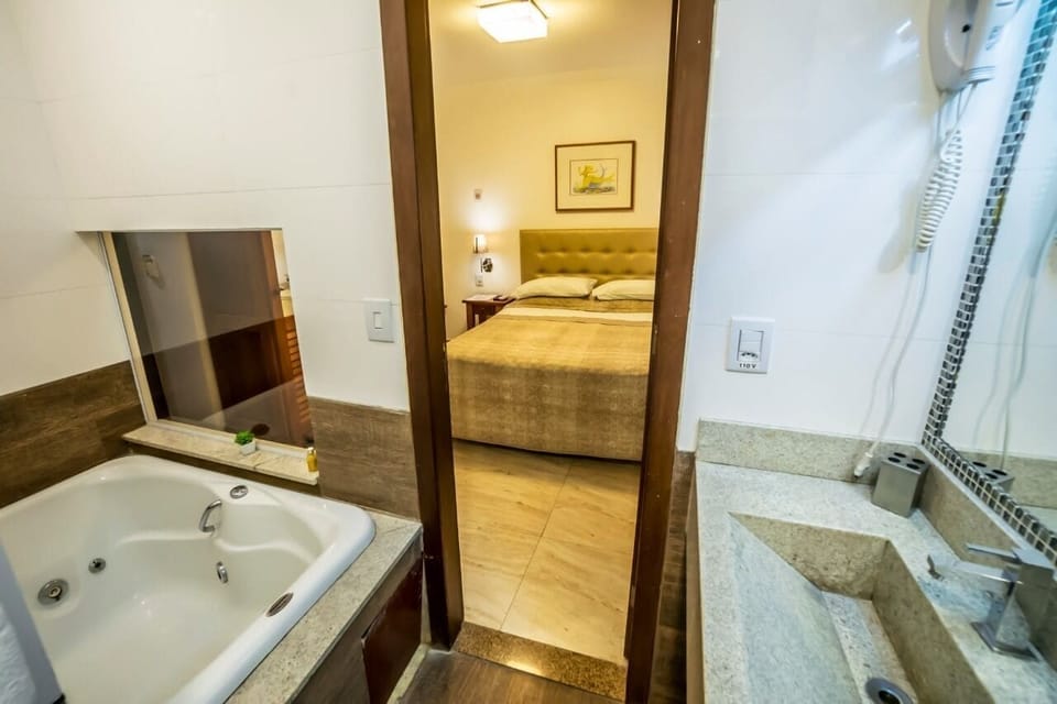 Deluxe Double Room, Bathtub | Minibar, in-room safe, desk, blackout drapes