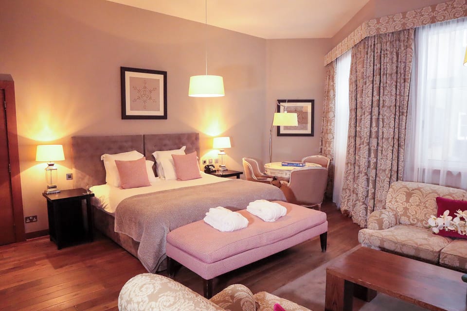Junior Suite | Minibar, in-room safe, desk, iron/ironing board